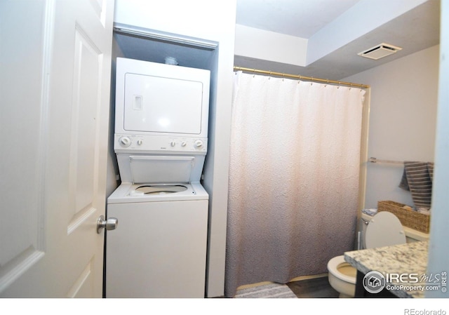 20 S Boulder Cir Unit 2204, Boulder, CO 80303 - laundry area with estacked washer and dryer