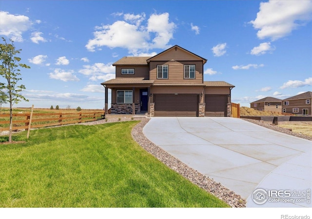 250 Chardon Ave, Brighton, CO 80601 - craftsman-style home with an attached garage, driveway, stone siding, and a porch