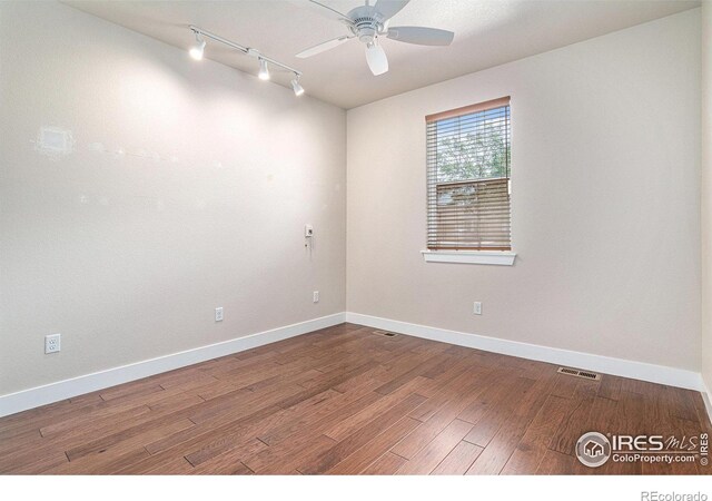 4751 Pleasant Oak Dr Unit A28, Fort Collins, CO 80525 - unfurnished room featuring ceiling fan, track lighting, baseboards, and wood finished floors