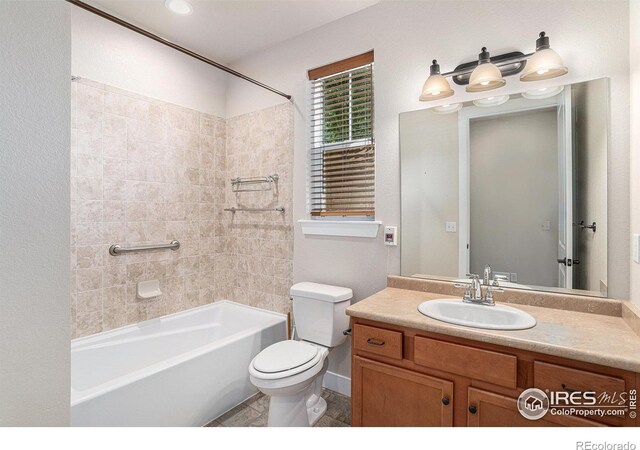4751 Pleasant Oak Dr Unit A28, Fort Collins, CO 80525 - full bathroom featuring toilet, vanity, bathing tub / shower combination, and baseboards