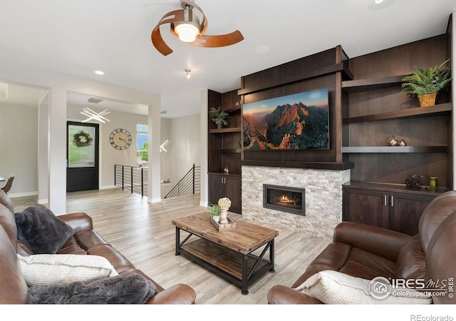 5966 Sunny Crest Dr, Timnath, CO 80547 - living area with a ceiling fan, light wood-style flooring, and baseboards