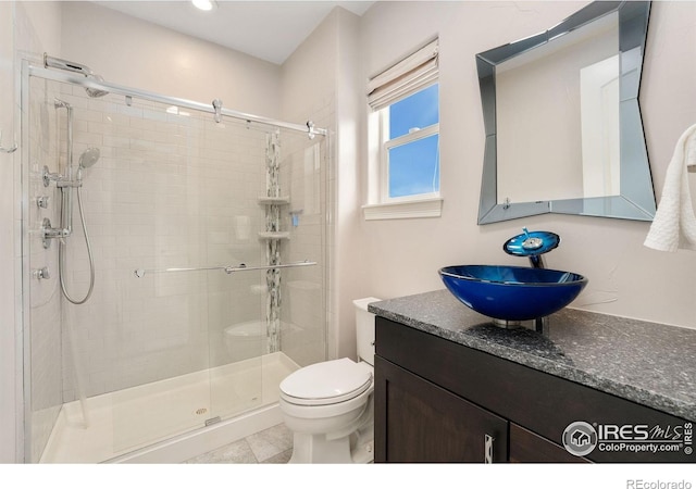 5966 Sunny Crest Dr, Timnath, CO 80547 - bathroom with a stall shower, toilet, and vanity