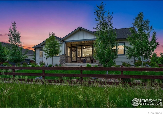 5966 Sunny Crest Dr, Timnath, CO 80547 - view of front of property with a fenced front yard and a porch