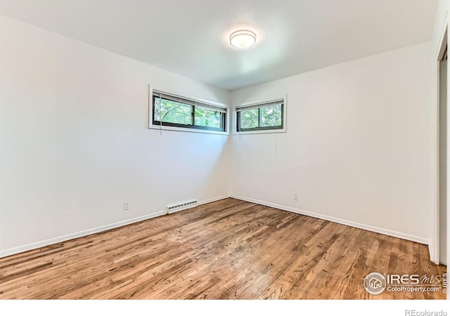 510 S 46th St, Boulder, CO 80305 - empty room featuring wood finished floors and baseboards