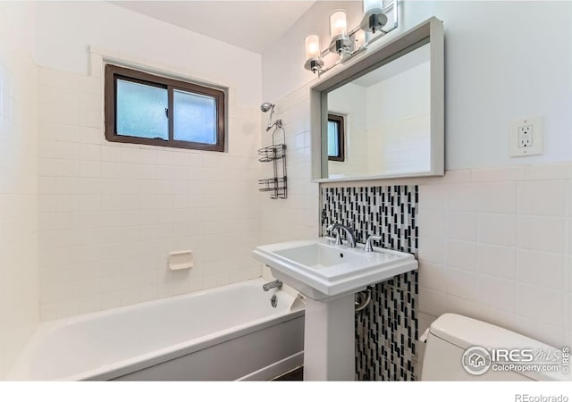 510 S 46th St, Boulder, CO 80305 - full bath featuring tile walls,  shower combination, and toilet