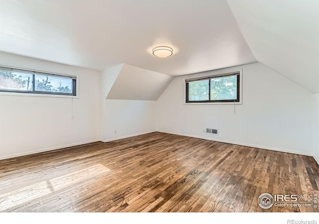 510 S 46th St, Boulder, CO 80305 - additional living space with wood-type flooring, lofted ceiling, and baseboards
