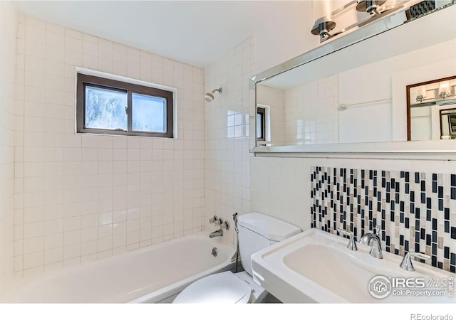 510 S 46th St, Boulder, CO 80305 - full bathroom featuring toilet, shower / bathtub combination, tile walls, a sink, and tasteful backsplash