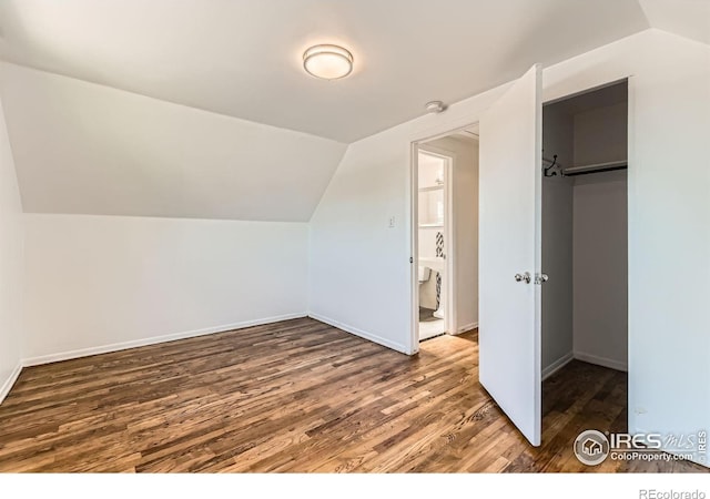 510 S 46th St, Boulder, CO 80305 - bonus room with lofted ceiling, wood finished floors, and baseboards