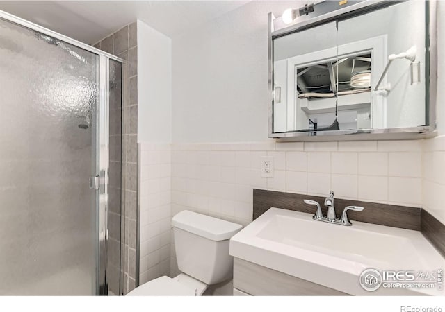 510 S 46th St, Boulder, CO 80305 - bathroom with toilet, vanity, and a stall shower