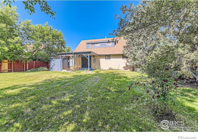 510 S 46th St, Boulder, CO 80305 - back of property featuring brick siding and roof with shingles