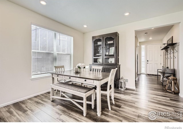 12889 Clearview St, Firestone, CO 80504 - dining space featuring wood finished floors and recessed lighting