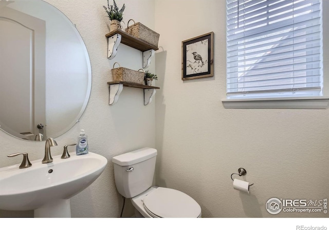 12889 Clearview St, Firestone, CO 80504 - half bath featuring a sink and toilet