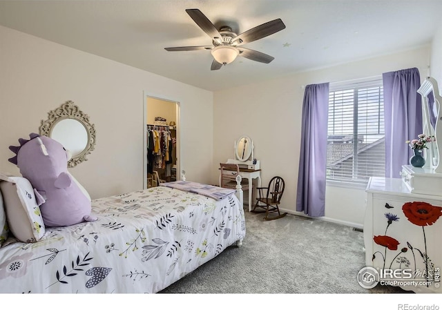 12889 Clearview St, Firestone, CO 80504 - bedroom with carpet floors, a walk in closet, a ceiling fan, and a closet