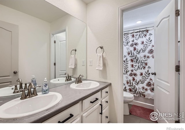 12889 Clearview St, Firestone, CO 80504 - full bath with double vanity, tile patterned flooring, and shower / tub combo