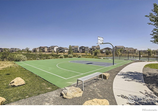 12889 Clearview St, Firestone, CO 80504 - view of sport court with community basketball court and a residential view