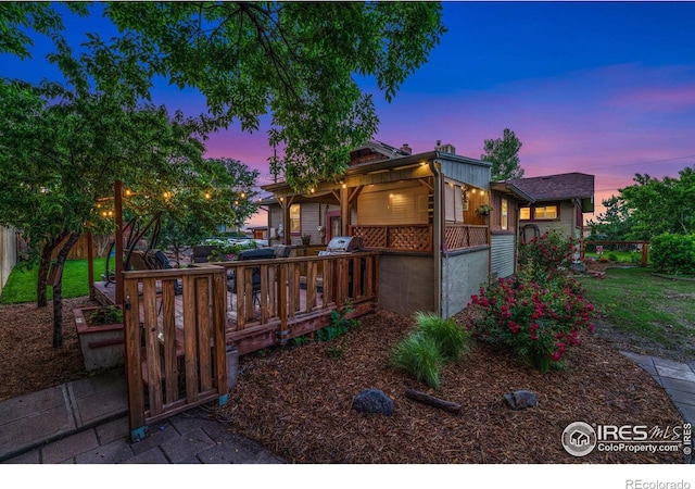 4900 W 6th Ave, Denver, CO 80204 - view of front of home featuring a wooden deck