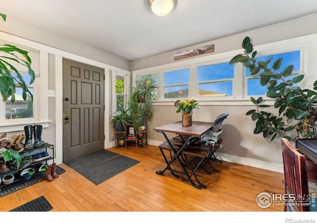 4900 W 6th Ave, Denver, CO 80204 - entryway featuring wood-type flooring and baseboards