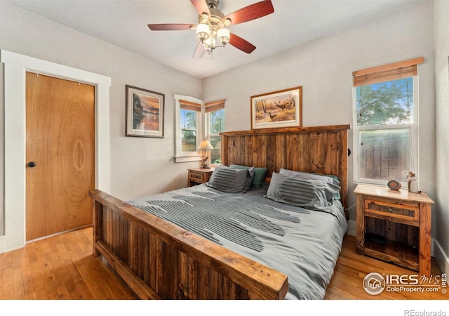 4900 W 6th Ave, Denver, CO 80204 - bedroom with wood finished floors and a ceiling fan