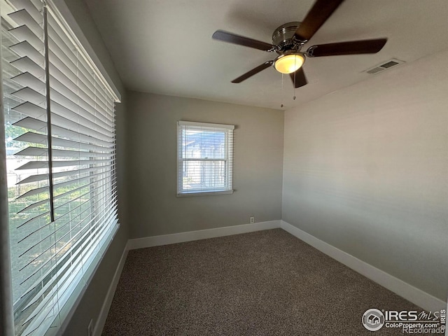 611 N 2nd St, Sterling, CO 80751 - carpeted empty room with baseboards and ceiling fan