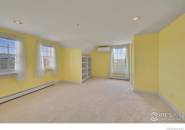 2994 75th St, Boulder, CO 80301 - carpeted spare room featuring a wall unit AC, a baseboard heating unit, healthy amount of natural light, a baseboard radiator, and recessed lighting