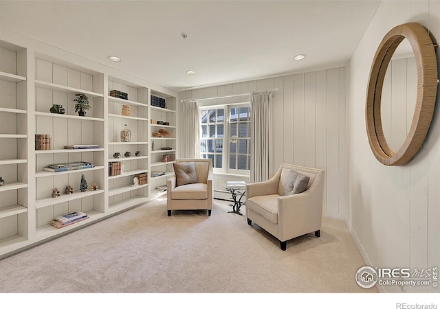 2994 75th St, Boulder, CO 80301 - sitting room with carpet floors, recessed lighting, built in shelves, a baseboard radiator, and baseboards