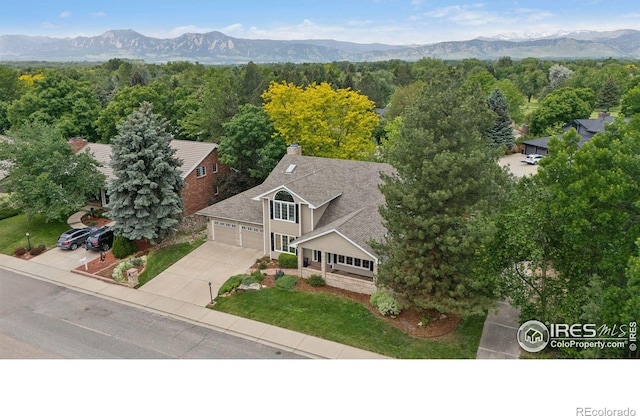 4483 S Meadow Dr, Boulder, CO 80301 - view from above of property featuring a mountain backdrop and a heavily wooded area
