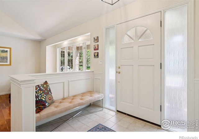 4483 S Meadow Dr, Boulder, CO 80301 - entryway featuring vaulted ceiling and light tile patterned flooring
