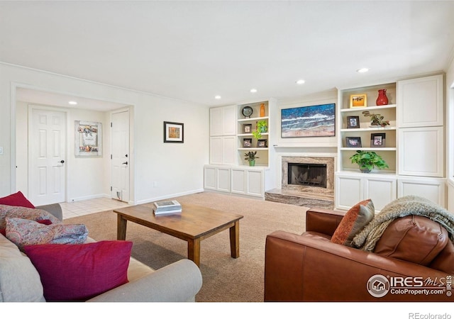 4483 S Meadow Dr, Boulder, CO 80301 - living room featuring recessed lighting, a premium fireplace, baseboards, and light carpet