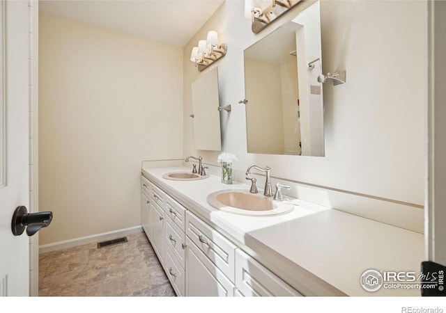 4483 S Meadow Dr, Boulder, CO 80301 - full bath with double vanity and baseboards