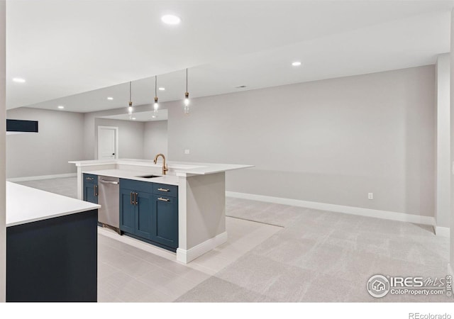 1425 Burt Ave, Berthoud, CO 80513 - kitchen with blue cabinets, a sink, stainless steel dishwasher, baseboards, and recessed lighting