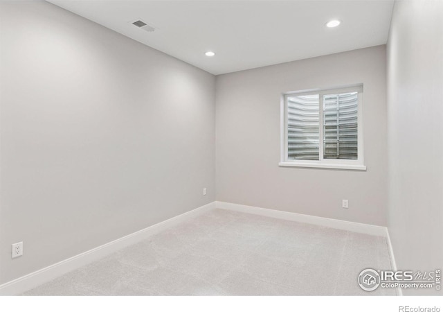 1425 Burt Ave, Berthoud, CO 80513 - unfurnished room featuring light colored carpet, baseboards, and recessed lighting