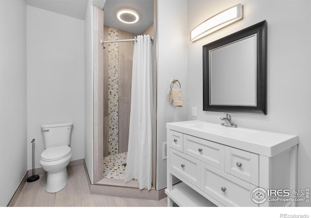 505 Nesting Eagles Way, Berthoud, CO 80513 - full bathroom with toilet, a stall shower, and vanity