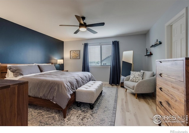 5609 Mount Sanitas Ave, Longmont, CO 80503 - bedroom featuring wood finished floors and a ceiling fan