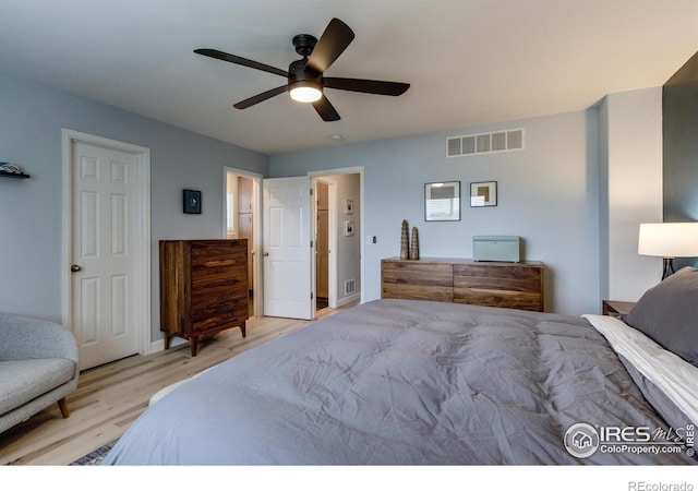5609 Mount Sanitas Ave, Longmont, CO 80503 - bedroom featuring wood finished floors and ceiling fan