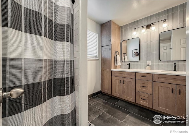 5609 Mount Sanitas Ave, Longmont, CO 80503 - full bath with double vanity and decorative backsplash