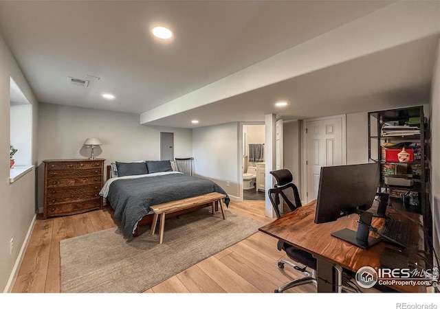 5609 Mount Sanitas Ave, Longmont, CO 80503 - bedroom featuring light wood-style floors, baseboards, connected bathroom, and recessed lighting