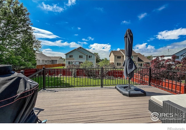 5609 Mount Sanitas Ave, Longmont, CO 80503 - wooden deck with a residential view