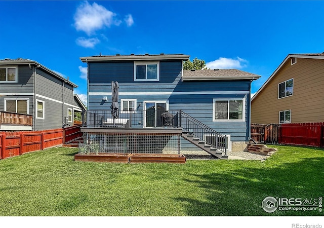 5609 Mount Sanitas Ave, Longmont, CO 80503 - back of house with stairs and a wooden deck