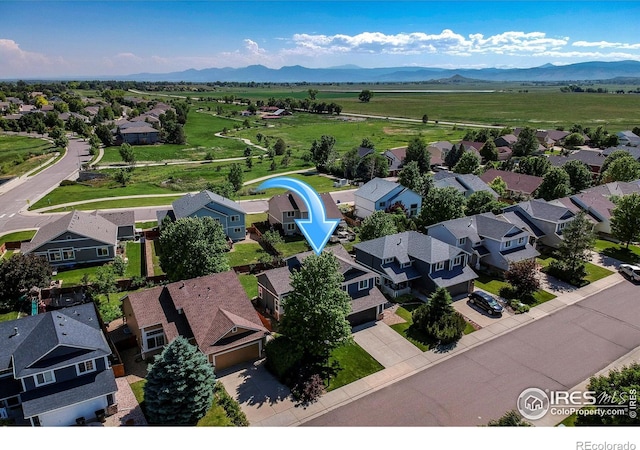 5609 Mount Sanitas Ave, Longmont, CO 80503 - aerial view of residential area with a mountain backdrop