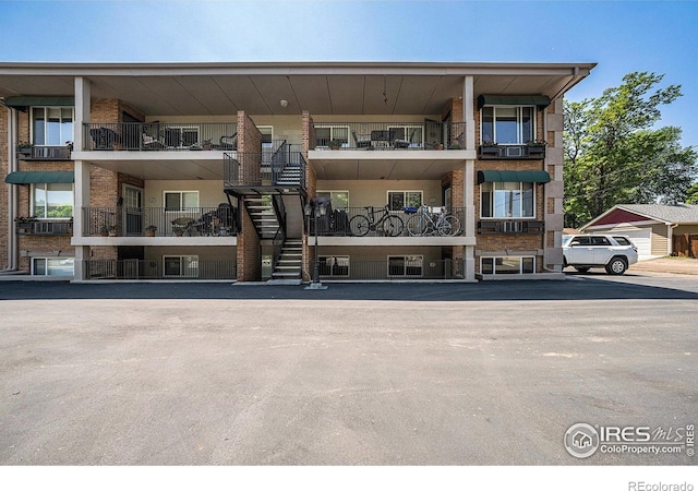 233 N Meldrum St Unit 8, Fort Collins, CO 80521 - view of apartment building / complex with stairs