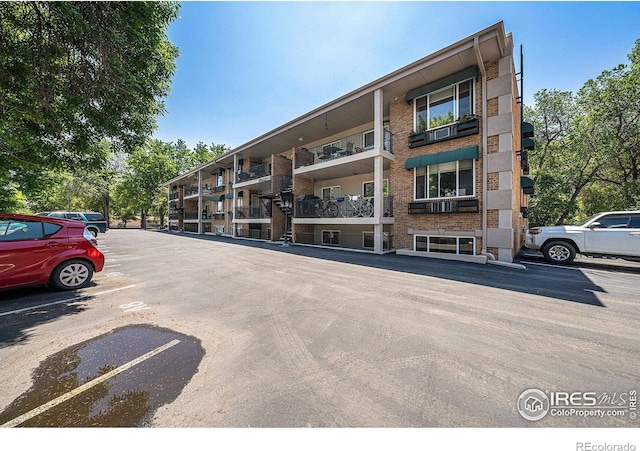 233 N Meldrum St Unit 8, Fort Collins, CO 80521 - view of apartment building / complex with uncovered parking