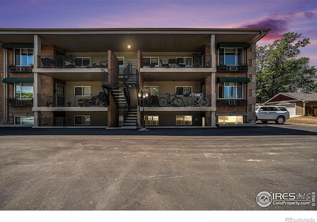 233 N Meldrum St Unit 8, Fort Collins, CO 80521 - view of property at dusk