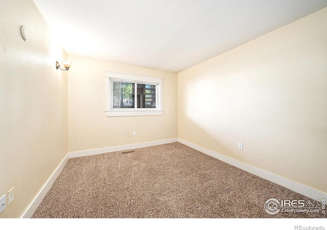 233 N Meldrum St Unit 8, Fort Collins, CO 80521 - carpeted spare room with baseboards