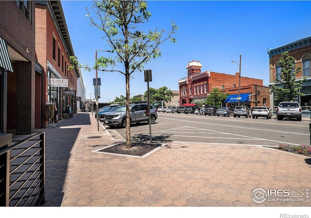 233 N Meldrum St Unit 8, Fort Collins, CO 80521 - view of asphalt street featuring street lights, sidewalks, and curbs