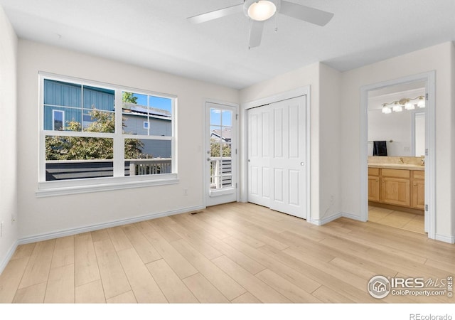 555 Laramie Blvd, Boulder, CO 80304 - unfurnished bedroom with light wood-style flooring, baseboards, and access to outside