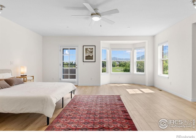 555 Laramie Blvd, Boulder, CO 80304 - bedroom with light wood-style floors, baseboards, and a ceiling fan