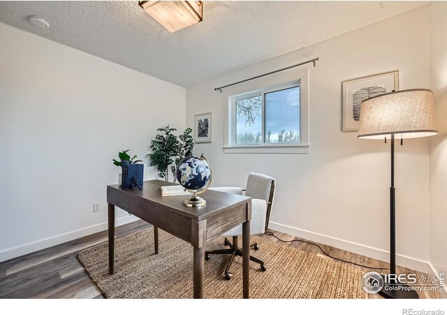1498 Wicklow St, Boulder, CO 80303 - office featuring wood finished floors and a textured ceiling