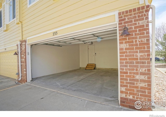 2855 Rock Creek Cir Unit 233, Superior, CO 80027 - garage featuring a garage door opener