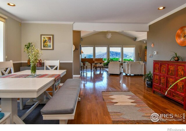 1960 Colard Ln, Lyons, CO 80540 - dining space featuring hardwood / wood-style flooring, recessed lighting, crown molding, lofted ceiling, and a mountain view