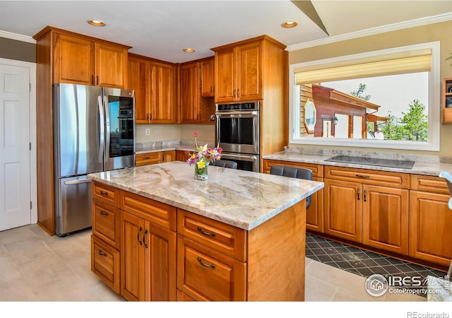 1960 Colard Ln, Lyons, CO 80540 - kitchen with appliances with stainless steel finishes, ornamental molding, light stone countertops, a kitchen island, and light tile patterned floors